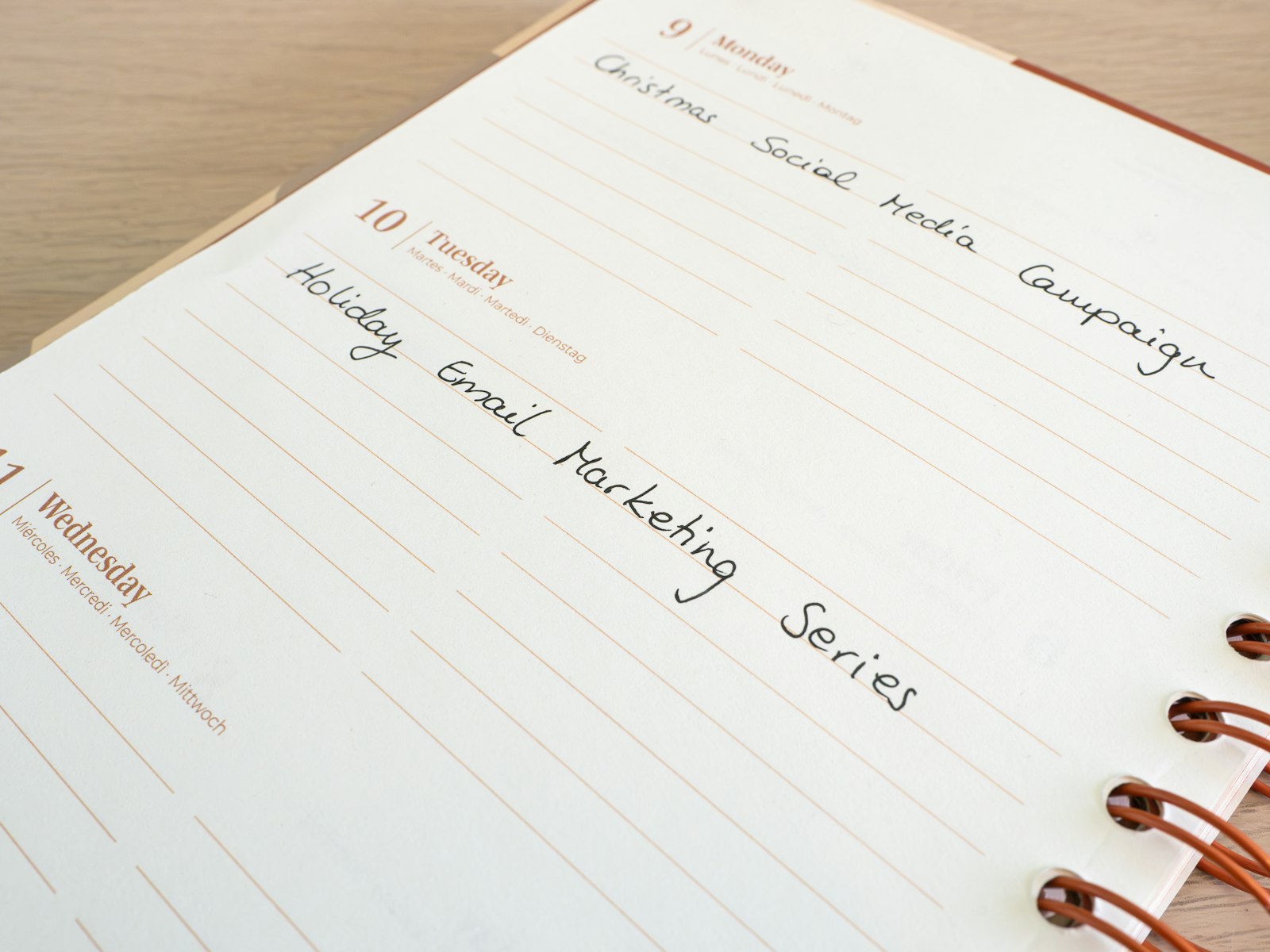 A planner and notebook in morning light