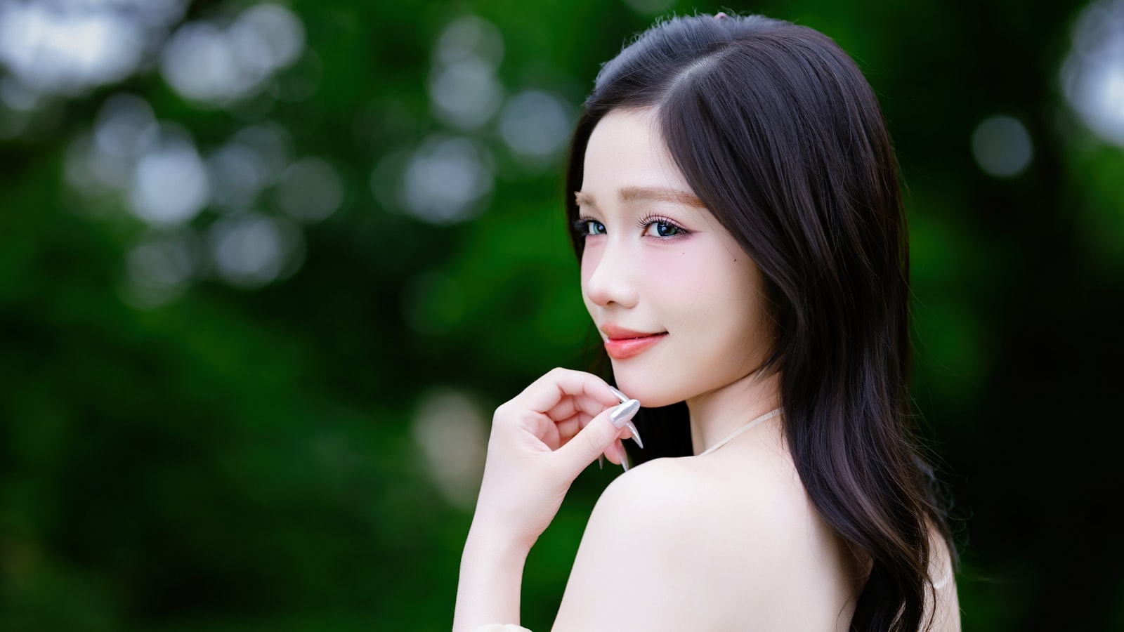 A woman smiling outdoors