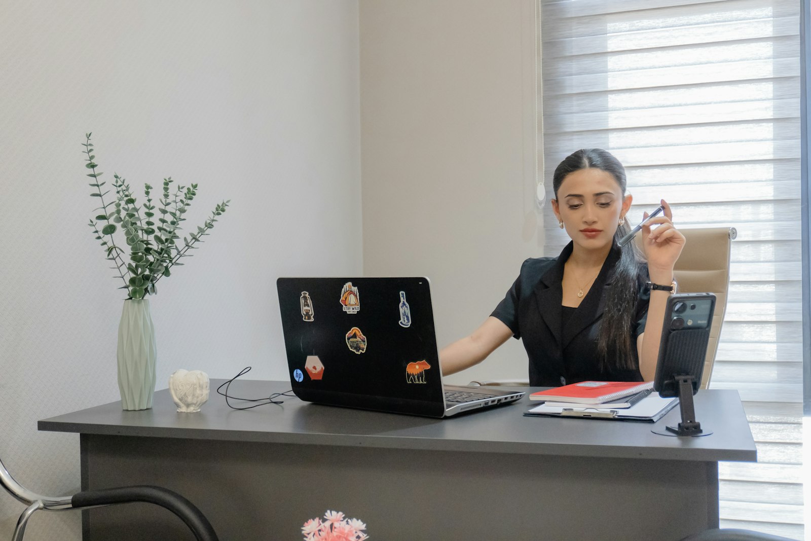 A clinician working from a quiet home office